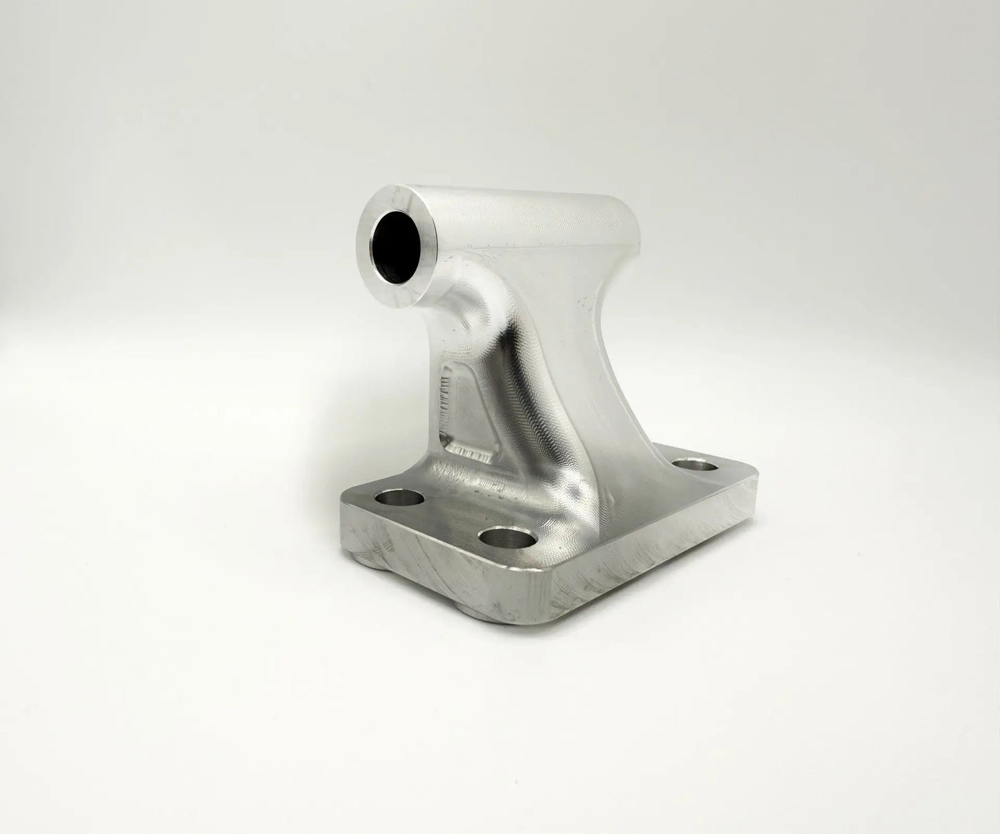 CNC-machined billet alternator mount for Cummins 5.9L and 6.7L engines, precision cut with four mounting holes