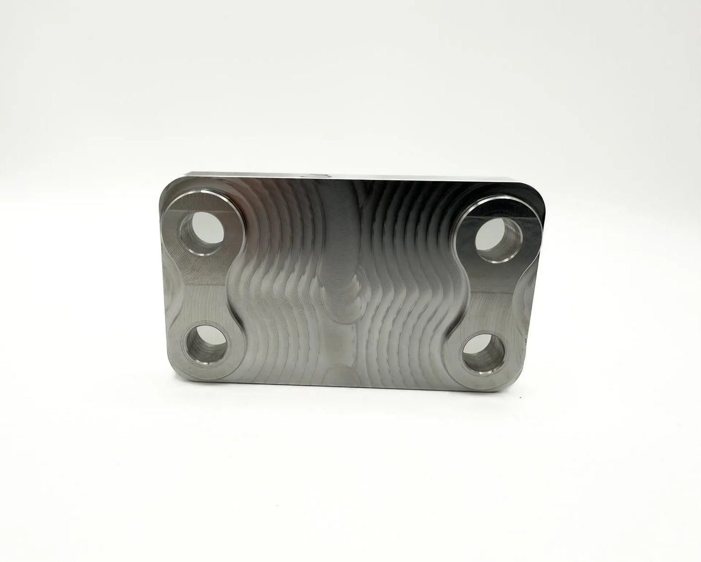 Polished billet alternator mount bracket showing reinforced gusset and clean CNC lines for Cummins engine